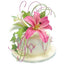 A decorated white cake with pink and white lilies, green leaves, and purple curly vine accents on a white background.