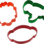 Three jungle animal-shaped cookie cutters in brown, green, and orange on a white background
