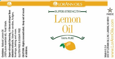 Loránn Oils Lemon Oil label with lemon illustration on a white background