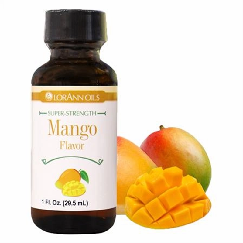 Bottle of LorAnn Oils Mango flavor with mangoes on a white background