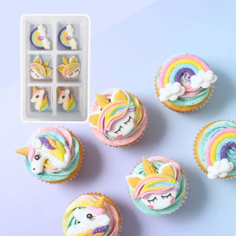 Unicorn-themed cupcakes using the set of 6 Unicorn themed icing decorations