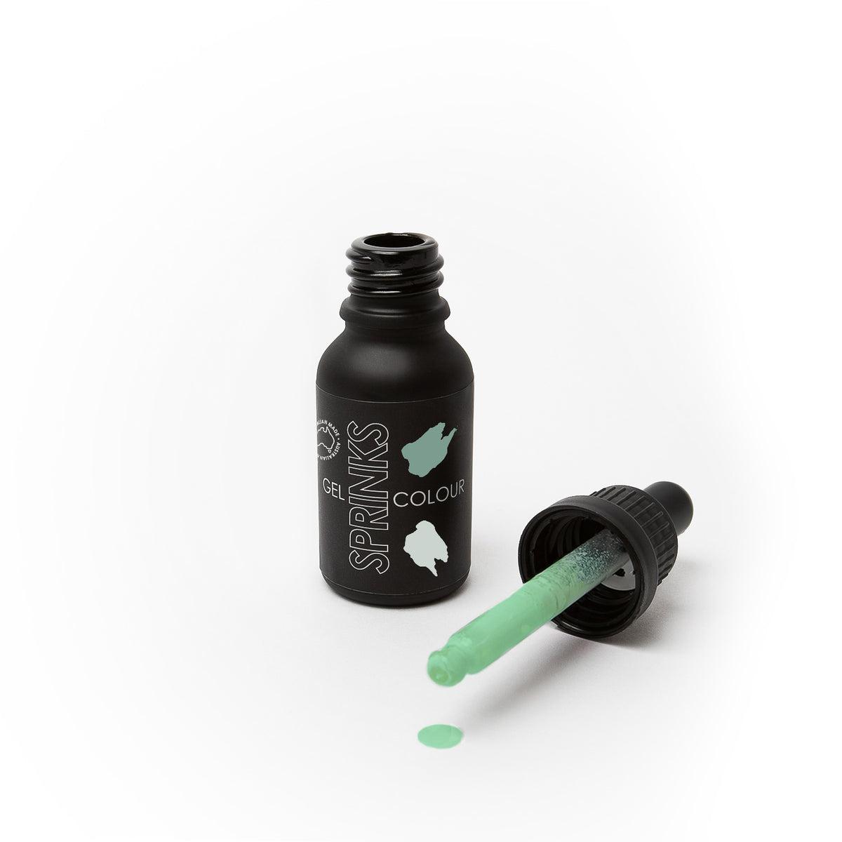 Black bottle of Sprinks gel color with a dropper filled with green liquid on a white background