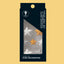 Packaging of Sprinks shimmer stars icing decorations on a beige background