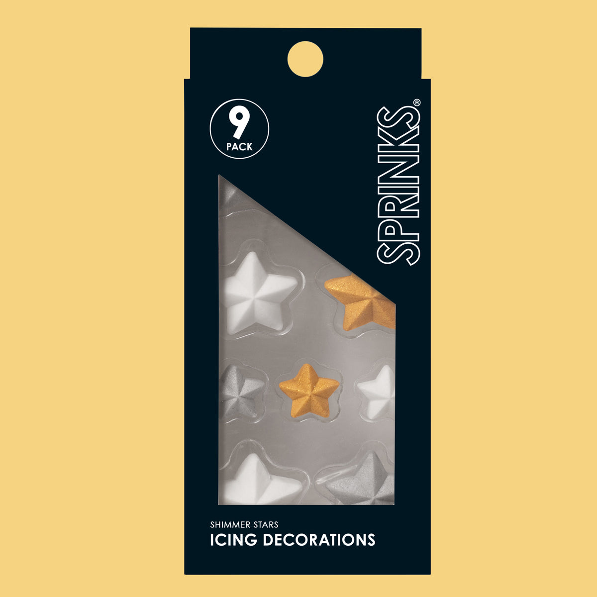 Packaging of Sprinks shimmer stars icing decorations on a beige background