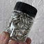 edible silver hearts dragees in jar