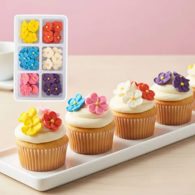 Decorative flower topped cupcakes.