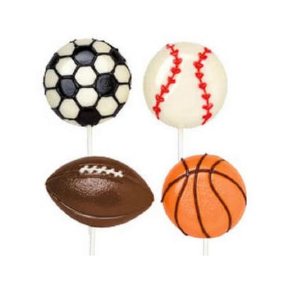 Four sports-themed lollipops shaped like a soccer ball, baseball, football, and basketball on white background.