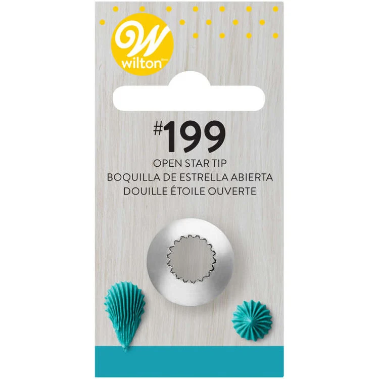 Wilton #199 Open Star Tip on its original retail packaging card. The card is light wood-grain with a yellow Wilton logo, black text, and shows a silver metal tip in the center, flanked by two teal star-shaped frosting decorations.