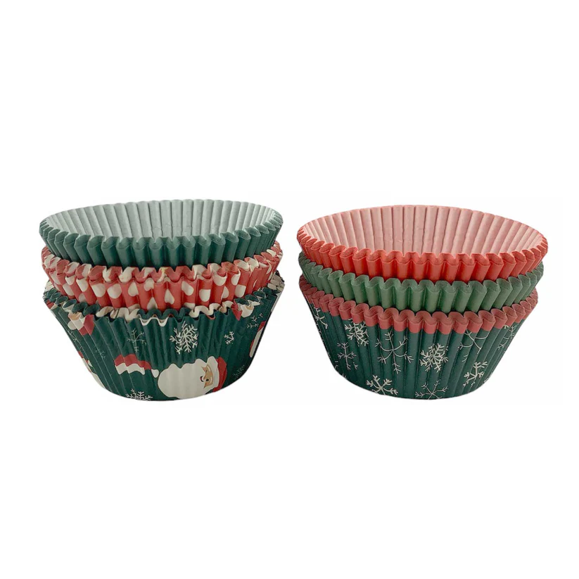Set of festive cupcake liners with Christmas designs on a white background