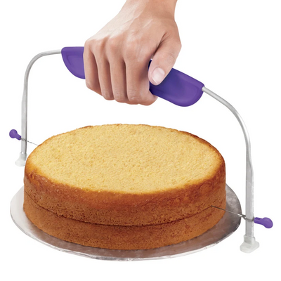 a cake leveller torting a cake in half