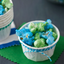 White Wilton nut cups filled with coloured popcorn