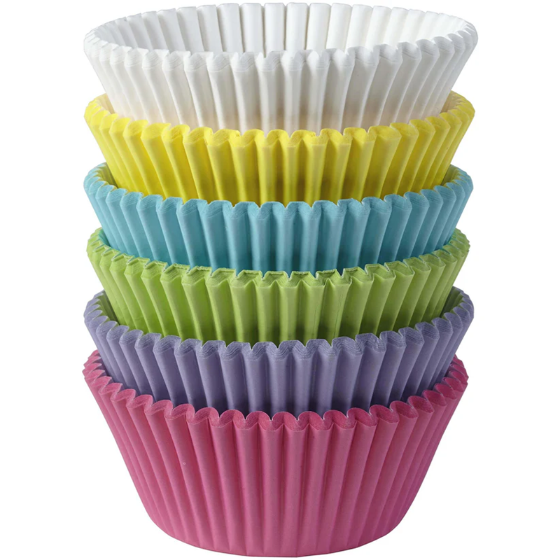 Stack of colorful cupcake liners in white, yellow, blue, green, and pink on a white background.
