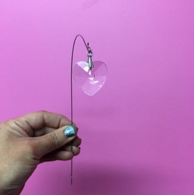 Crystal heart drop on metal wire