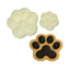 Two paw-shaped cutters made for decorating cakes and pastries, representing dog or cat paws. Alongside an icing example