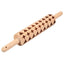 Christmas embossed wooden rolling pin by Wilton