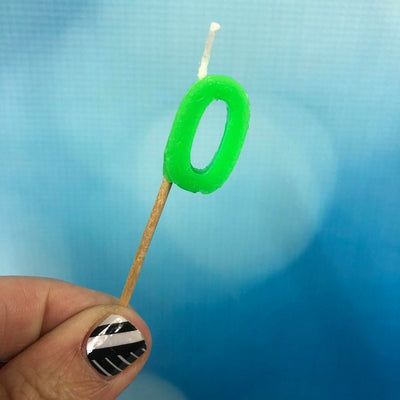 Alphabet or numeral candle on wooden pick Letter O or NUMBER 0 Green