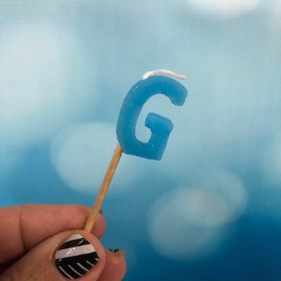 Alphabet or numeral candle on wooden pick Letter G Blue