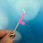 Alphabet or numeral candle on wooden pick Letter L Pink