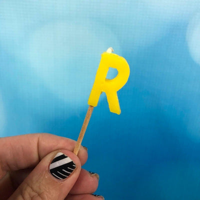 Alphabet or numeral candle on wooden pick Letter R Yellow