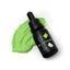 A bottle of Sprinks lime green gel colour placed on a surface with a swatch of the green color below.