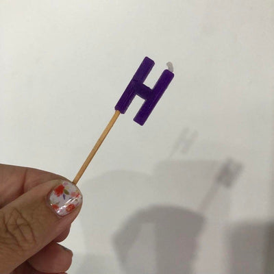 Alphabet or numeral candle on wooden pick Letter H Purple