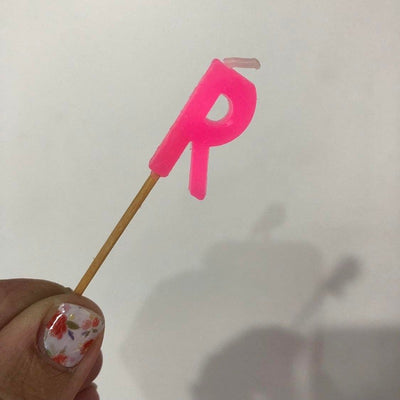 Alphabet or numeral candle on wooden pick Letter R Pink