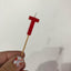 Alphabet or numeral candle on wooden pick Letter T Red