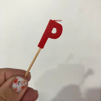 Alphabet or numeral candle on wooden pick Letter P Red