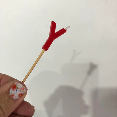 Alphabet or numeral candle on wooden pick Letter Y Red