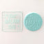 Teal icing embossed with Best mum ever. And the debosser tool used to make it