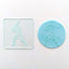 A clear debosser tool with a cricket player design, accompanied by a blue imprint of the same design on icing.