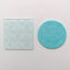 clear acrylic embossing tool with swirling wave pattern. Alongside a fondant plaque showcasing the design