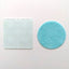 a clear acrylic debosser embossing tool with a pattern of all over flowers. Sitting alongside a finished example made using it of a teal fondant plaque