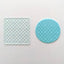 Quilted embossing tool. Alongside a finished fondant plaque showcasing the design