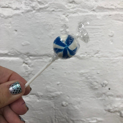 Blue and white round ball swirly lollipop