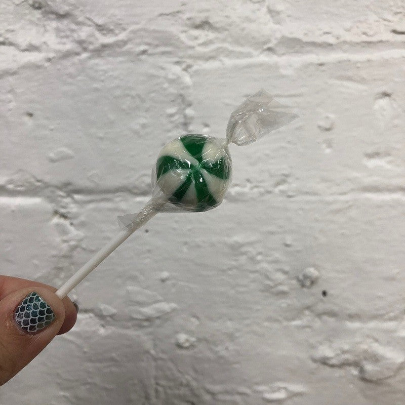 Green and white round ball swirly lollipop
