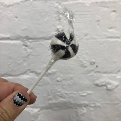 Black and white round ball swirly lollipop