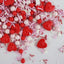 sprinkle mix of red hearts pink and red balls and pink and white accent sprinkles
